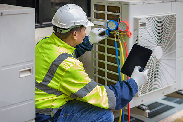 Professional Heat Pump Repair technician working in Kunia, HI